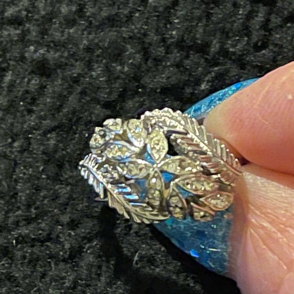 Trifari size 6 and 7 missing one stone adjusts size